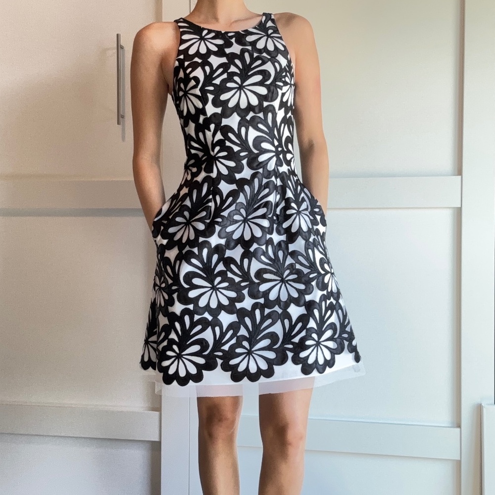 An old fashion black and white pencil dress